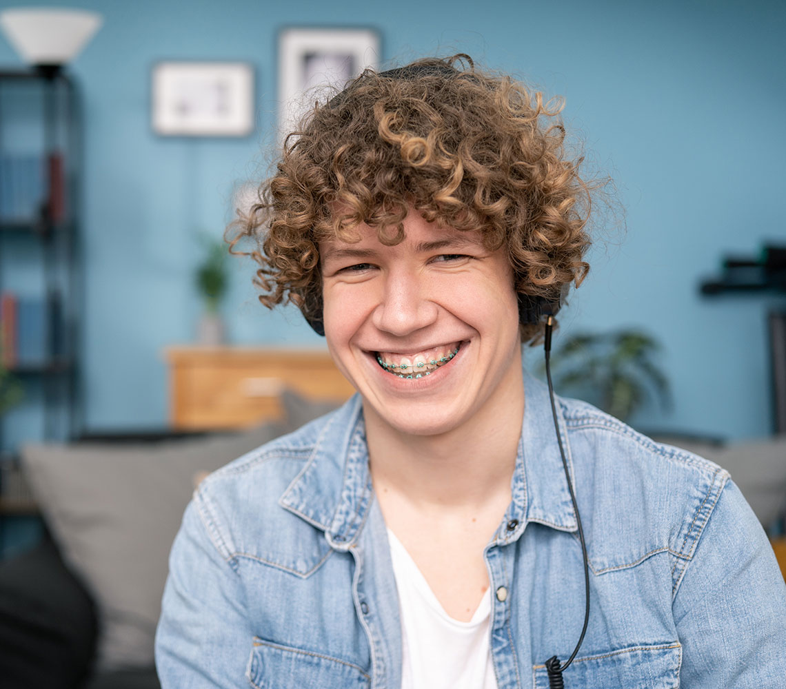 Smiling teenage boy with braces